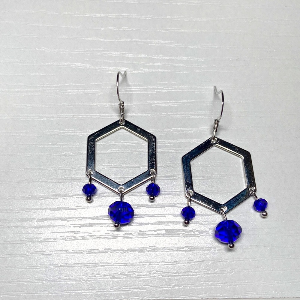 Handmade blue glass beaded and silver earrings.
